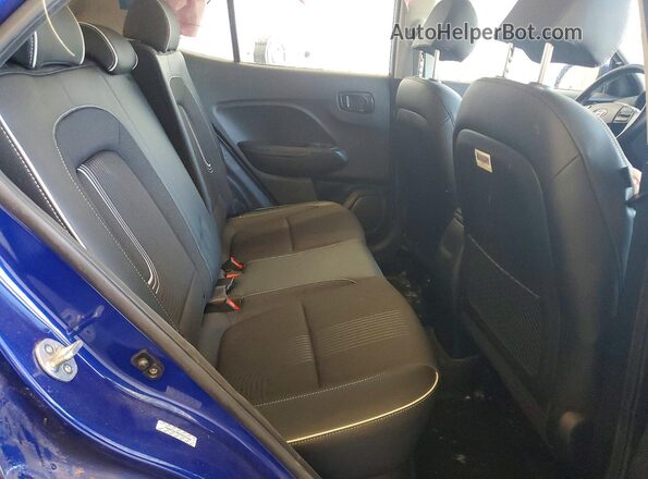 KMHRC8A35PU224465 2023 HYUNDAI VENUE Blue Rear interior view
