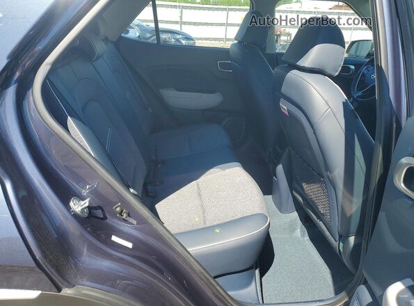 KMHRC8A36RU323881 2024 HYUNDAI VENUE Blue Rear interior view