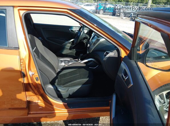 KMHTC6AD3HU308353 2017 HYUNDAI VELOSTER Оранжевый Вид салона спереди