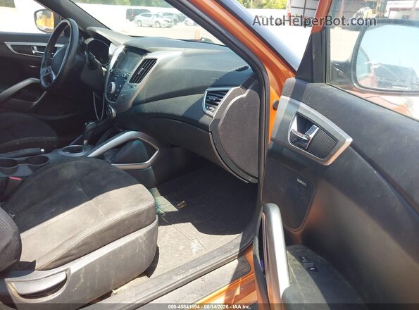 KMHTC6ADXHU312111 2017 HYUNDAI VELOSTER Orange წინა სალონის ხედი
