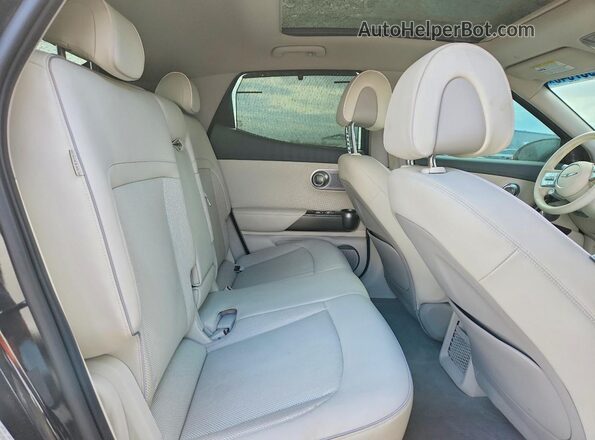 KMUKCDSC1RU020291 2024 GENESIS GV60 Black Rear seats view