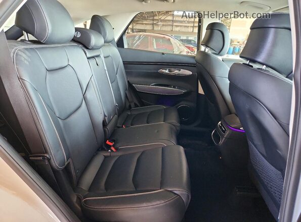 KMUMADTB4NU072643 2022 GENESIS GV70 White Rear interior view