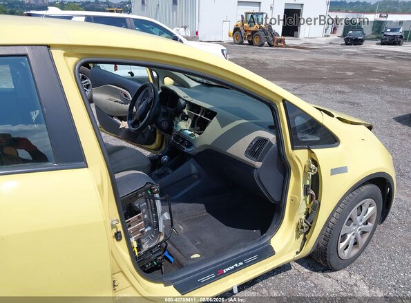 KNADM4A32G6553405 2016 KIA RIO Yellow Widok wnętrza z przodu