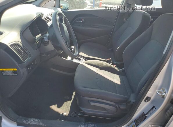 KNADM4A33G6558189 2016 KIA RIO Silver Vista interior delantera