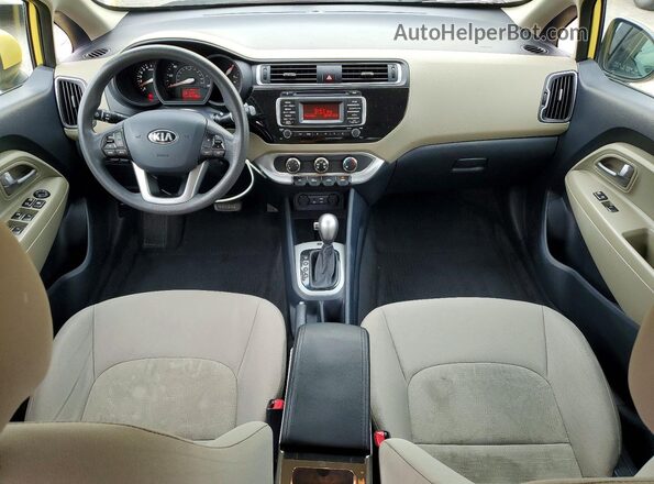 KNADM4A34G6607609 2016 KIA RIO Yellow Widok deski rozdzielczej