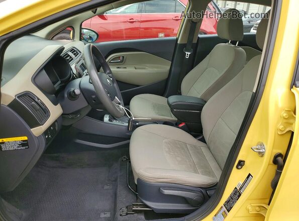 KNADM4A34G6607609 2016 KIA RIO Yellow Widok wnętrza z przodu