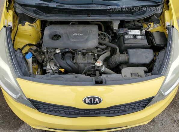 KNADM4A34G6607609 2016 KIA RIO Yellow Widok wnętrza z tyłu
