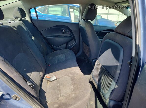 KNADM4A36G6596872 2016 KIA RIO Blue Vista de los asientos traseros