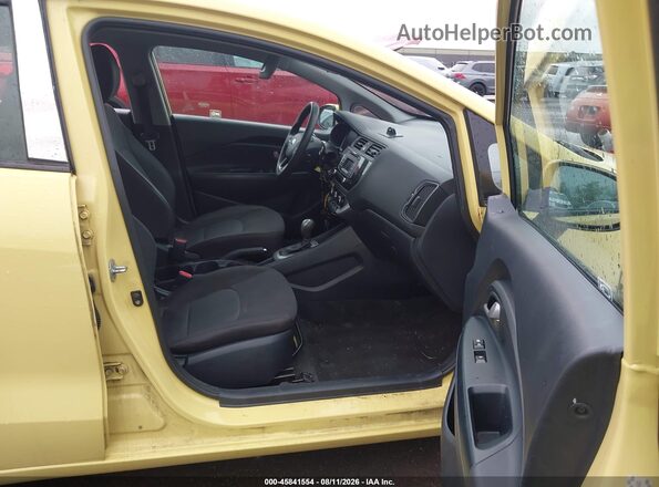 KNADM4A38G6544840 2016 KIA RIO Yellow Widok wnętrza z przodu