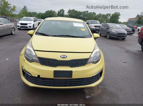 KNADM4A38G6544840 2016 KIA RIO Yellow Widok wnętrza z tyłu