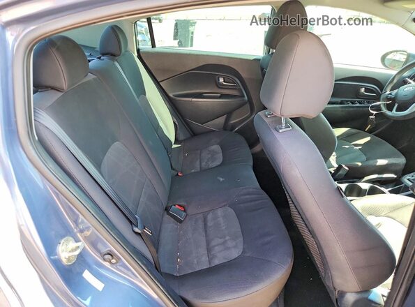KNADM4A39G6541252 2016 KIA RIO Teal Vista de los asientos traseros