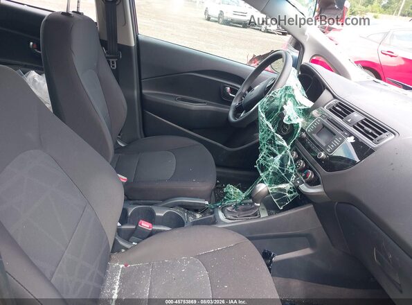KNADM4A3XG6659830 2016 KIA RIO Blue Front interior view