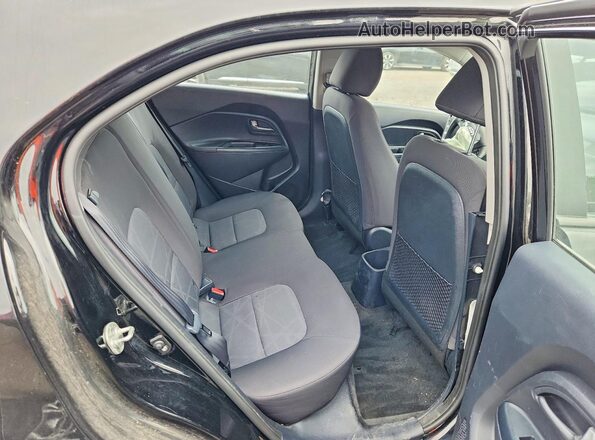 KNADM5A37G6735994 2016 KIA RIO Black Vista de los asientos traseros