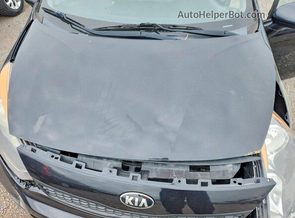 KNADM5A37G6735994 2016 KIA RIO Black Vista interior trasera