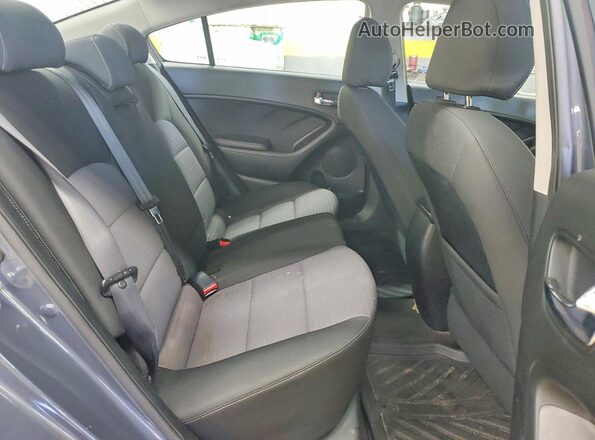 KNAFX4A6XG5580190 2016 KIA FORTE Blue Vista de los asientos traseros
