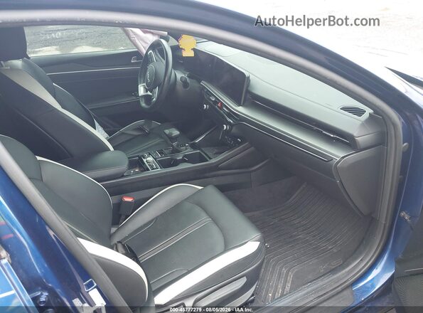 KNAG64J78S5286599 2025 KIA K5 Blue Widok wnętrza z przodu