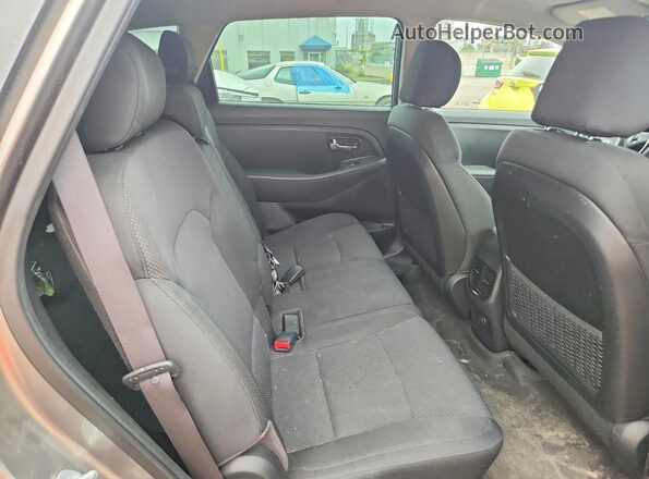 KNAHT8A39G7126003 2016 KIA RONDO Gray Rear seats view