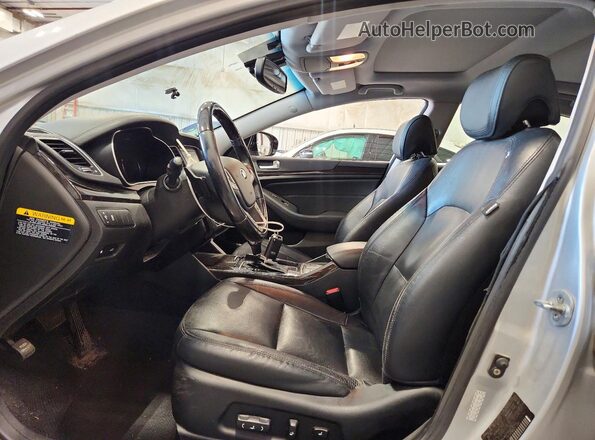 KNALN4D78G5218422 2016 KIA CADENZA Серебряный Вид салона спереди
