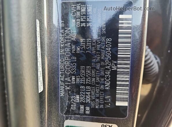KNDC34LA2P5604078 2023 KIA EV6 Gray VIN sticker view
