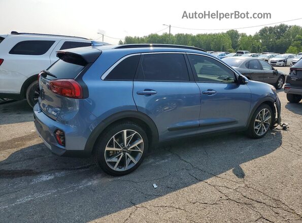 KNDCC3LC7N5546509 2022 KIA NIRO Blue Trasero derecho