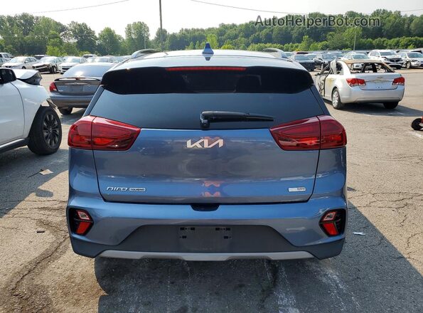 KNDCC3LC7N5546509 2022 KIA NIRO Blue Vista trasera
