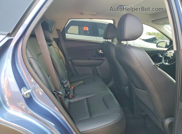 KNDCC3LC7N5546509 2022 KIA NIRO Blue Vista interior trasera