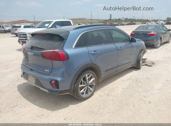 KNDCC3LC8N5515740 2022 KIA NIRO Light Blue Trasero derecho