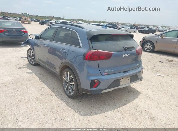 KNDCC3LC8N5515740 2022 KIA NIRO Light Blue Trasero izquierdo