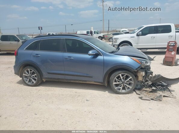 KNDCC3LC8N5515740 2022 KIA NIRO Light Blue Vista interior trasera