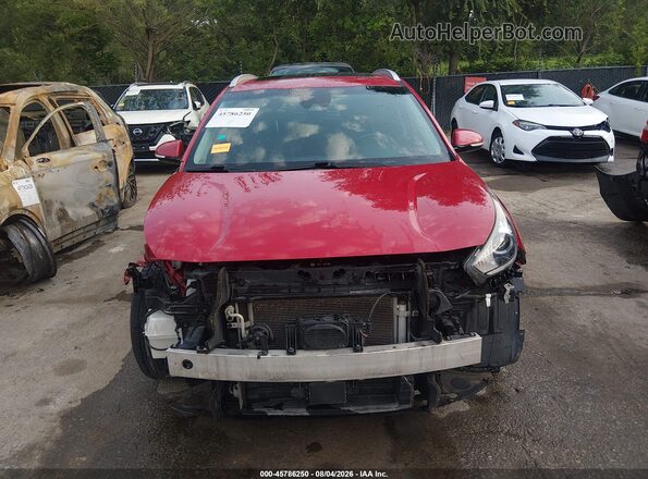 KNDCE3LC1J5171334 2018 KIA NIRO Red Vista interior trasera
