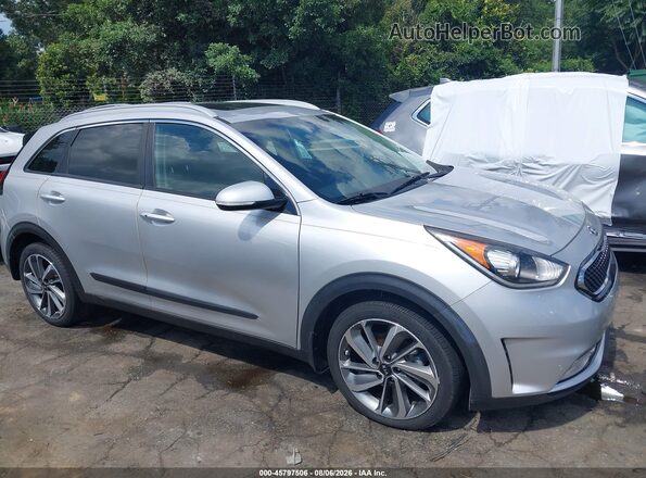 KNDCE3LC4H5082450 2017 KIA NIRO Silver Widok wnętrza z tyłu