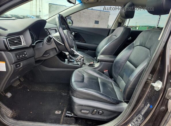 KNDCE3LC5J5174480 2018 KIA NIRO Purple Vista interior delantera