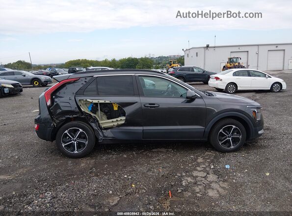 KNDCP3LE1P5086515 2023 KIA NIRO Gray Vista interior trasera