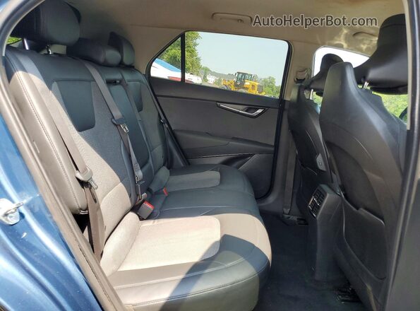 KNDCR3L14P5075192 2023 KIA NIRO Blue Vista de los asientos traseros