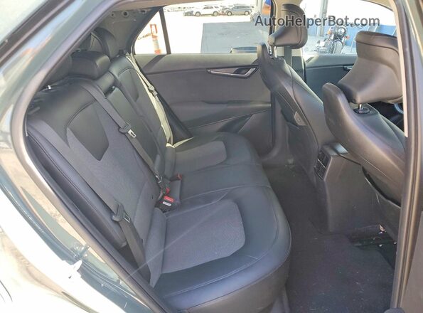 KNDCR3L19P5025128 2023 KIA NIRO Green Rear seats view