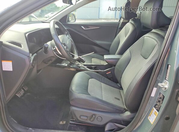 KNDCR3LE3P5060041 2023 KIA NIRO Green Widok wnętrza z przodu
