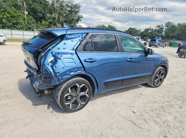KNDCR3LE3S5253105 2025 KIA NIRO Blue Trasero derecho