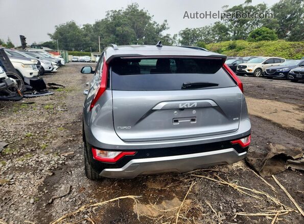 KNDCR3LE8P5099403 2023 KIA NIRO Tan უკანა ხედი