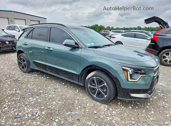 KNDCT3LE7P5045673 2023 KIA NIRO Teal Front right