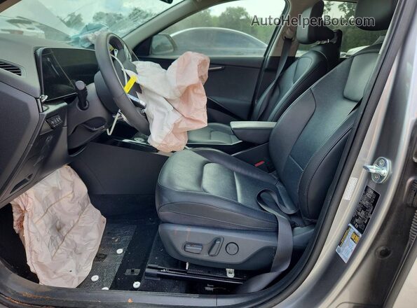 KNDCT3LEXP5034327 2023 KIA NIRO Gray Vista interior delantera