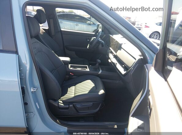 KNDEDCD37V7019403 2027 KIA SELTOS Light Blue Вид салона спереди