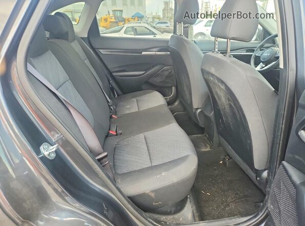KNDEPCAA1T7850127 2026 KIA SELTOS Black Vista de los asientos traseros