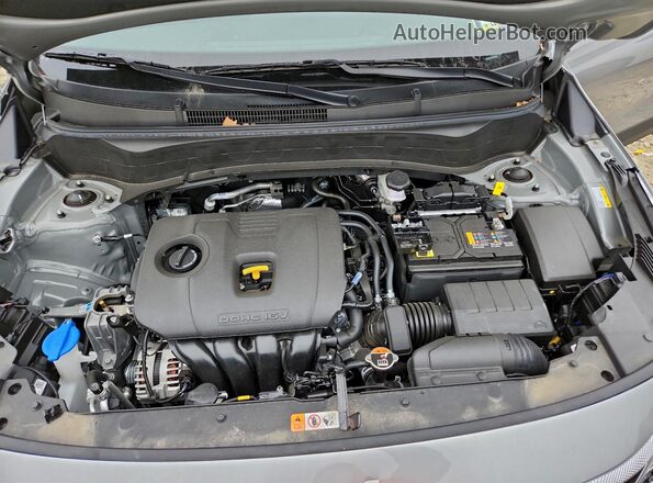 KNDEPCAAXS7808831 2025 KIA SELTOS Silver Vista del compartimento del motor