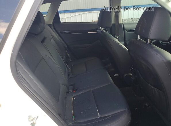 KNDERCAA2M7219348 2021 KIA SELTOS White უკანა სალონის ხედი