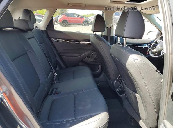 KNDERCAA2S7805030 2025 KIA SELTOS Charcoal Вид задньої частини салону