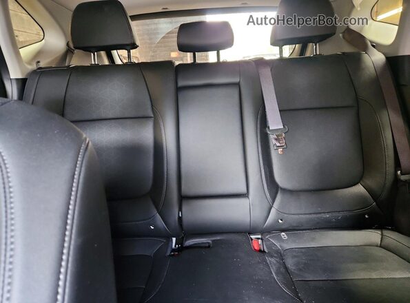 KNDERCAA2T7865097 2026 KIA SELTOS White Vista de los asientos traseros
