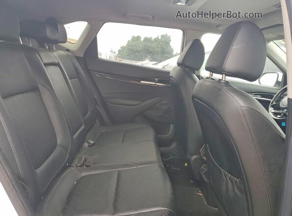 KNDERCAA5P7420875 2023 KIA SELTOS White Widok wnętrza z tyłu