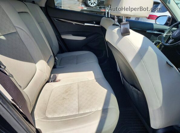 KNDERCAA7N7307586 2022 KIA SELTOS Black Rear interior view