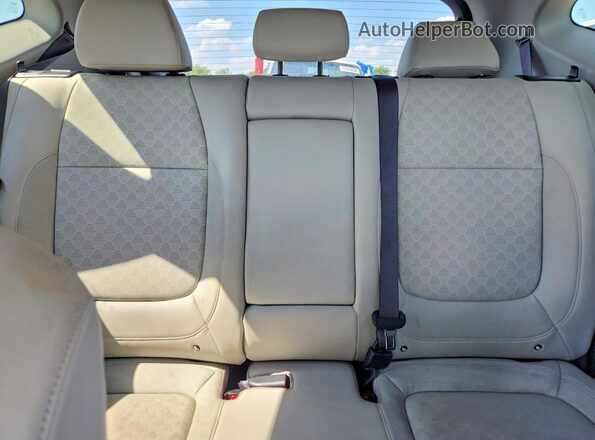 KNDERCAA7N7307586 2022 KIA SELTOS Black Rear seats view