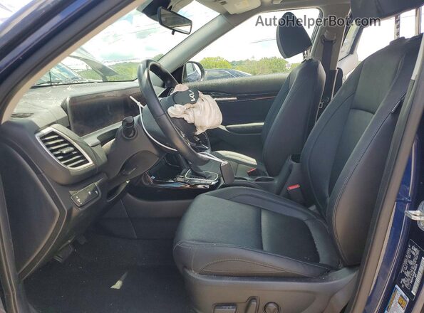 KNDERCAA8R7565976 2024 KIA SELTOS Blue Front interior view